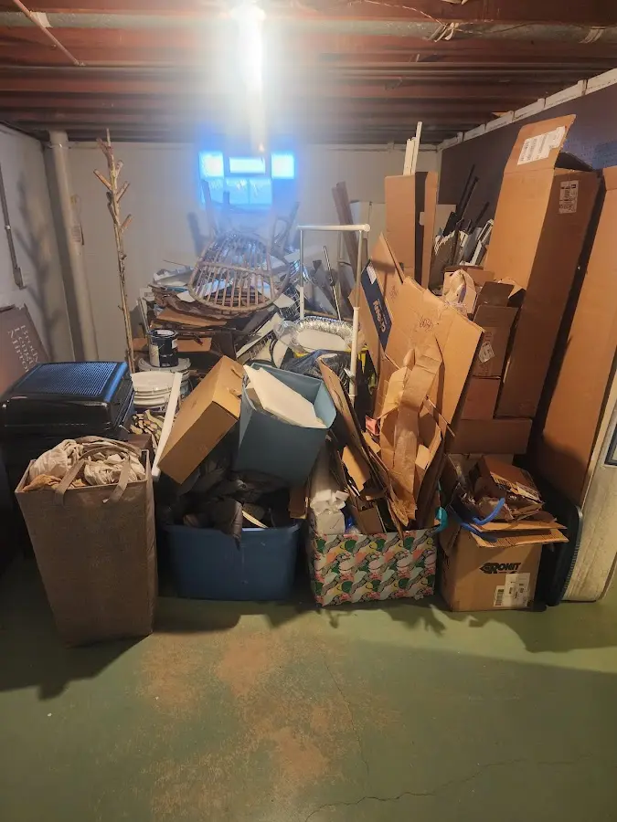 Roll-off dumpster container at job site for Yard Waste Dumpster Rental in St. Ann